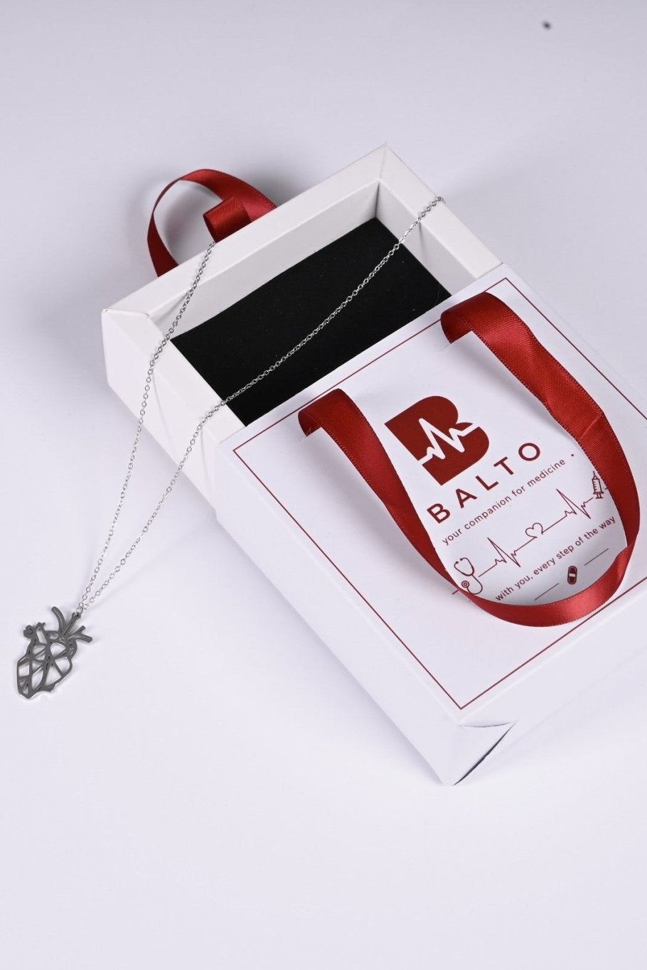 Silver anatomical heart pendant in BALTO gift box
