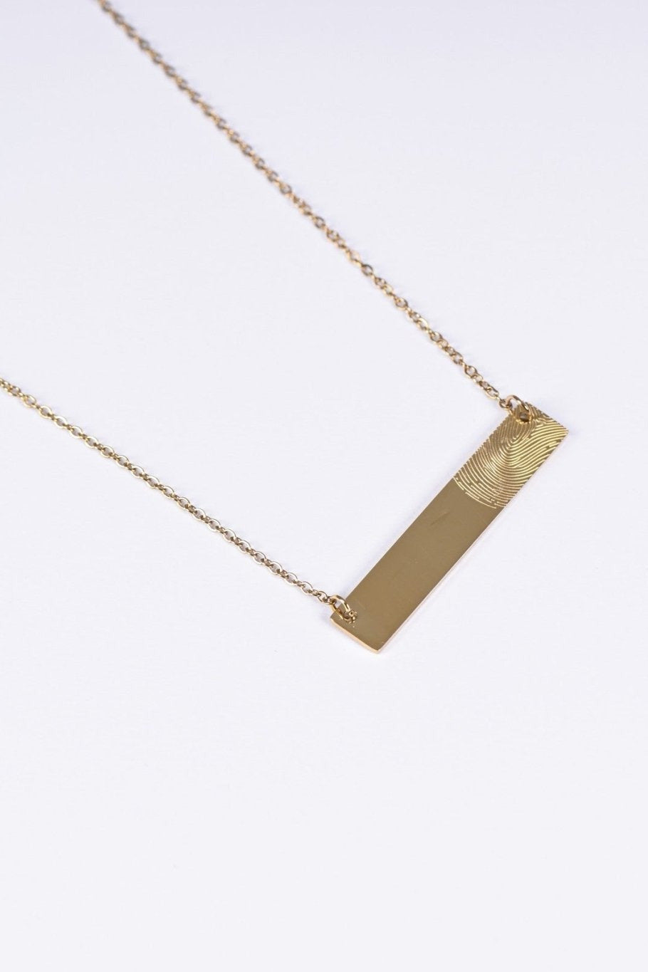 Fingerprint bar necklace in gold — BALTO