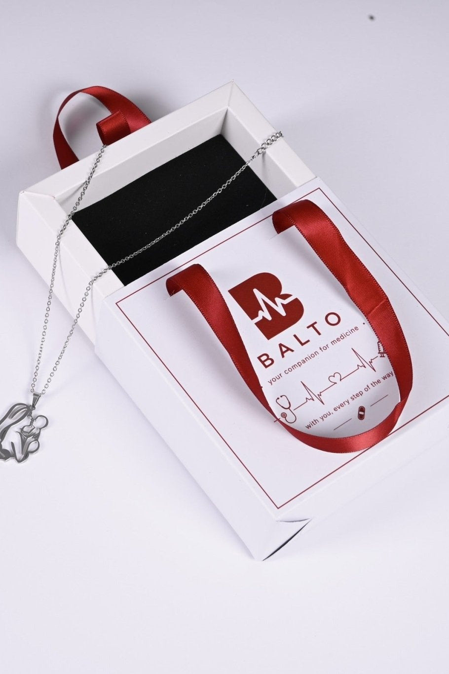 Silver mother and child pendant in BALTO gift box